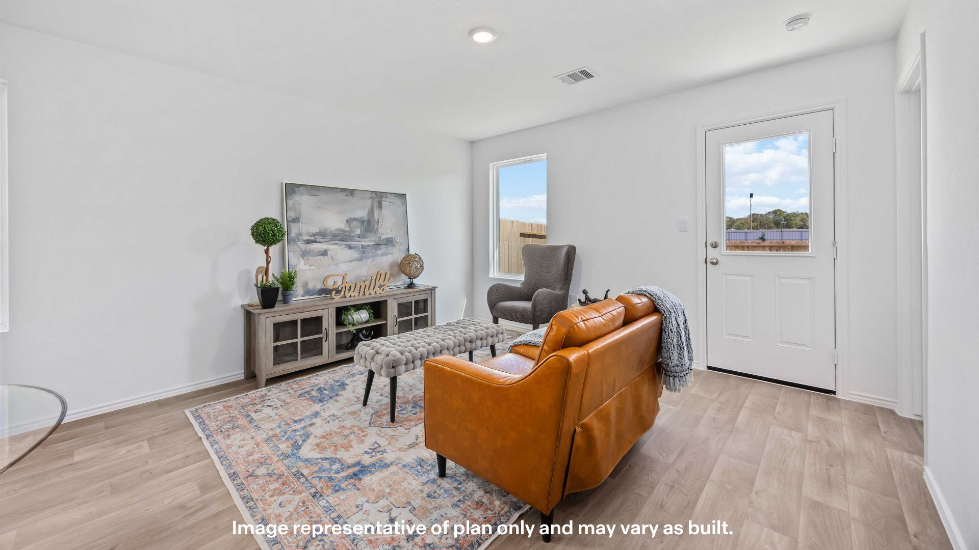 Open living and family room area with ample natural light