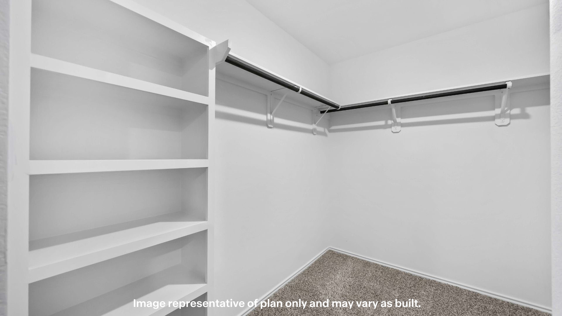 Private primary walk-in closet with extra storage space
