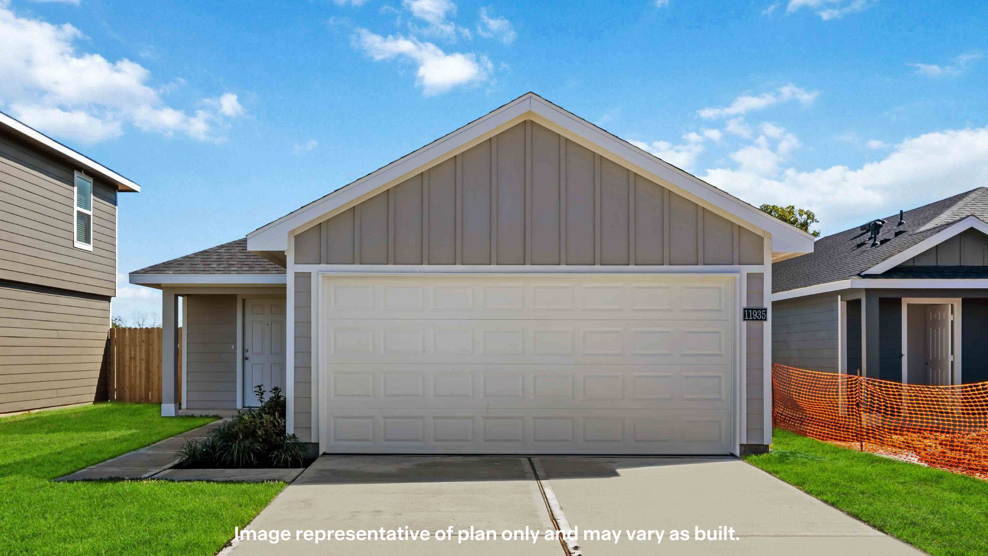 Exterior photo of single story home with sturdy siding exterior featuring timeless brick accents