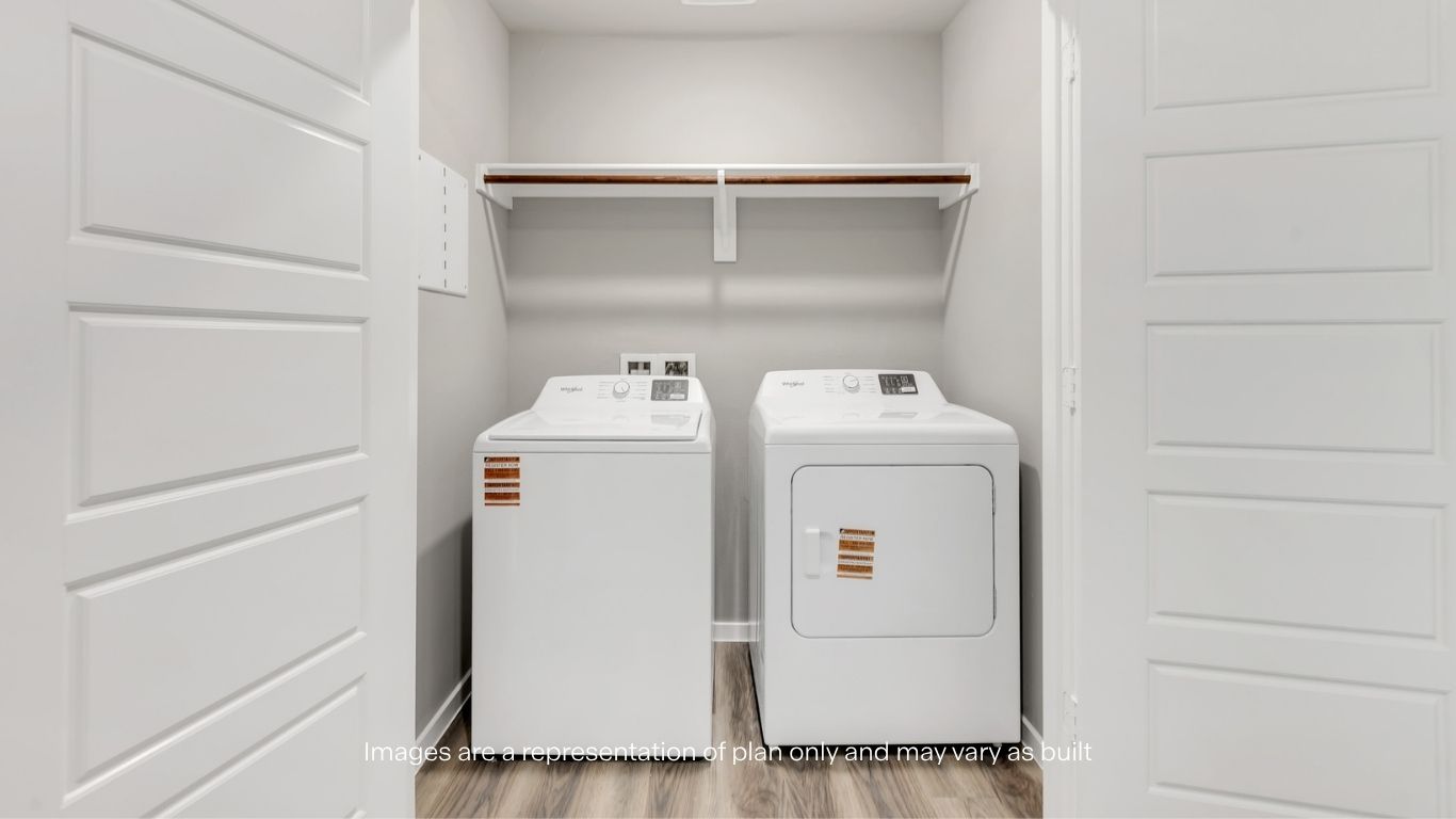 Convenient laundry room located inside the home.