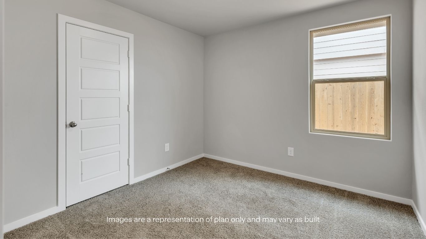 The secondary bathroom includes a full tub and shower combination with modern fixtures and finishes