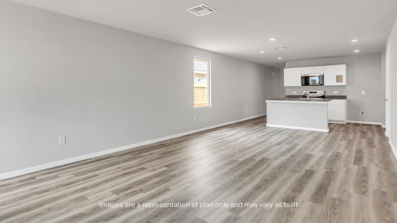With an open-concept layout and abundant natural light, the living space feels both inviting and spacious.