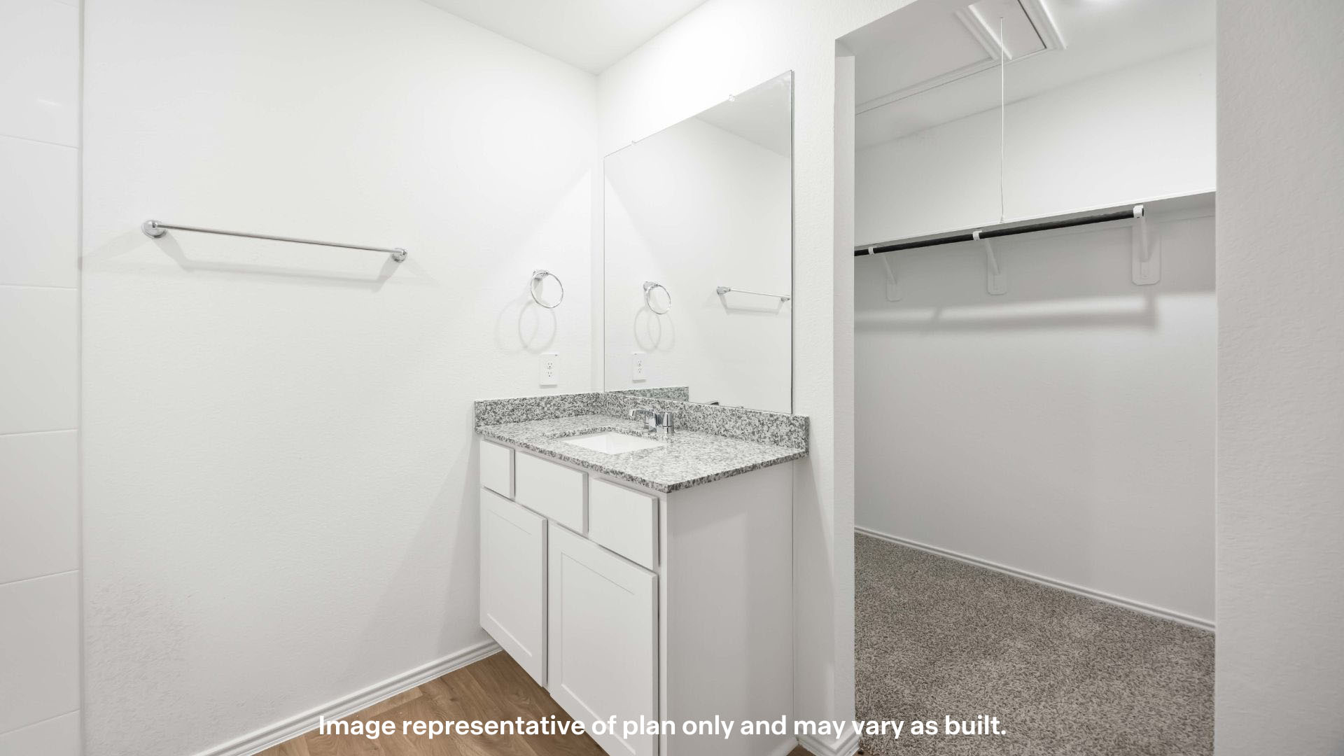 Primary walk-in closet with extra storage space