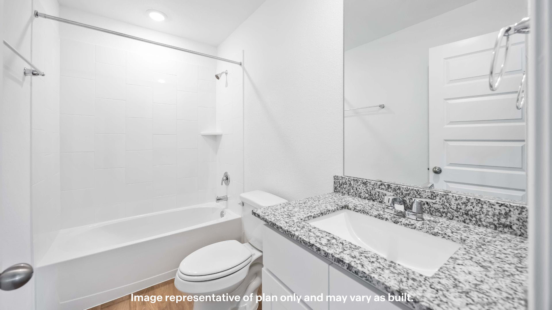 Guest bathroom with built in vanity and combination bathtub shower