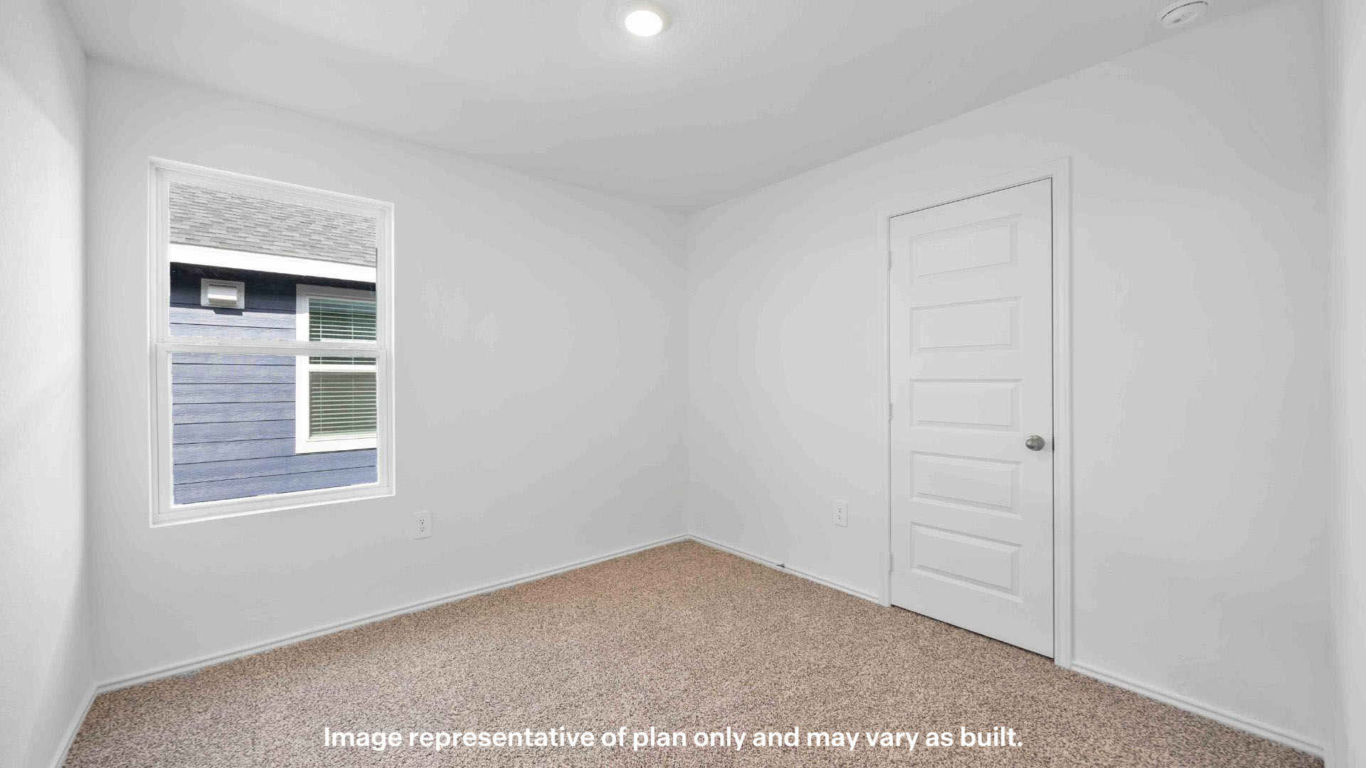 Guest bedroom 2 with side window and plush carpet floor