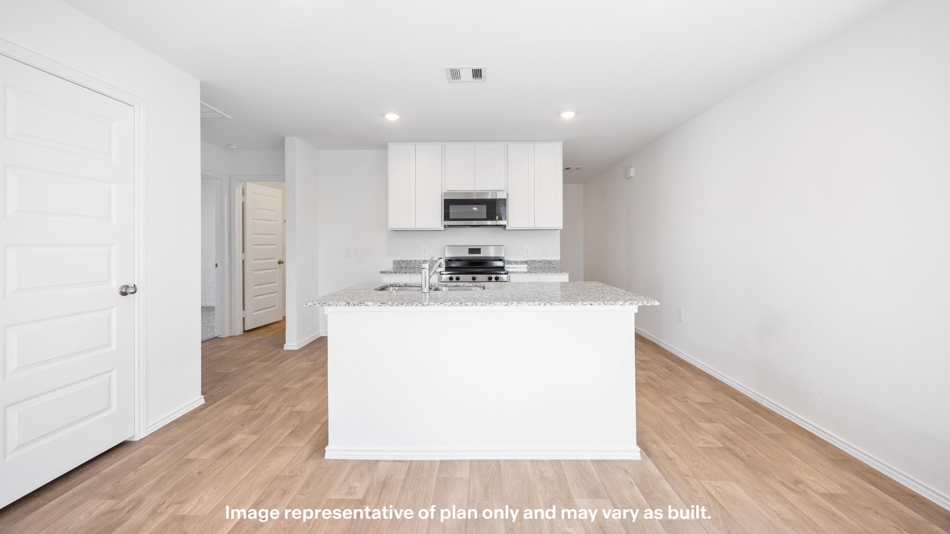 Spacious open kitchen overlooking family and living space