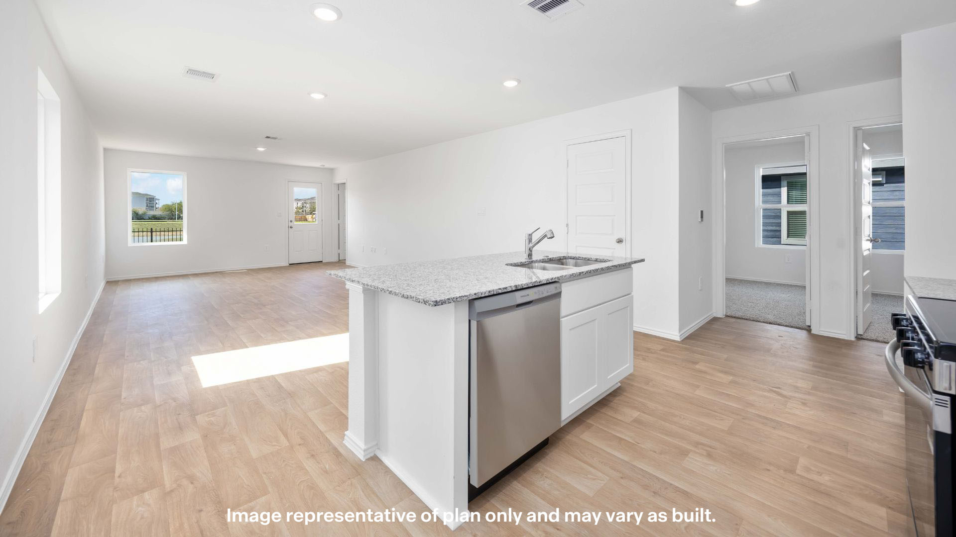 Open living and family room area with ample natural light