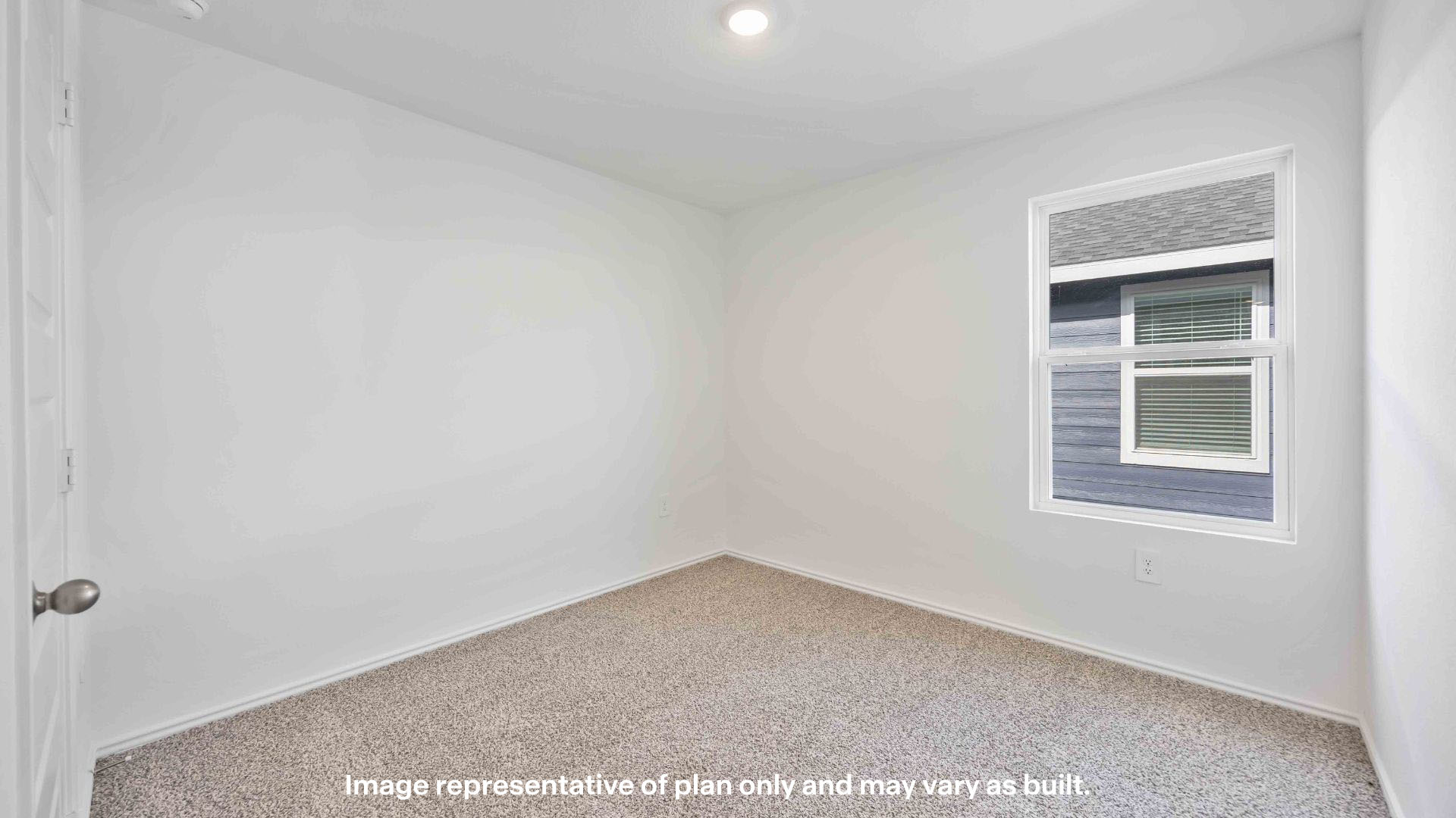 Guest bedroom 1 with side windows and ample natural light