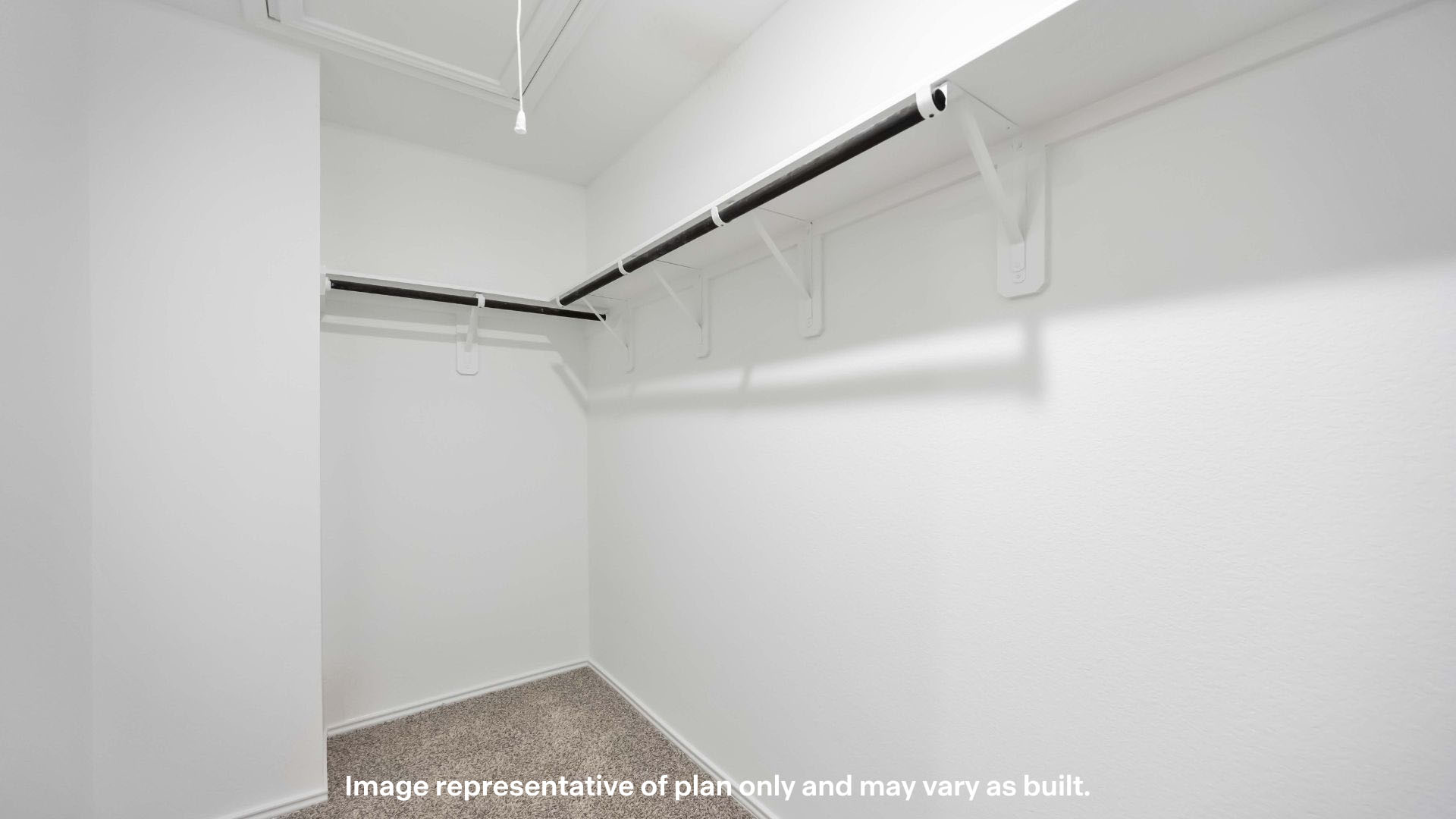 Primary walk-in closet with extra storage space