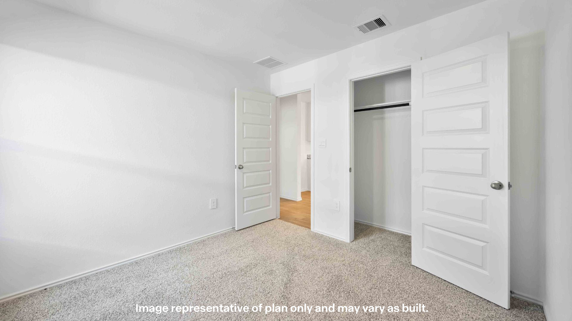 Guest bedroom 1 with side windows and ample natural light