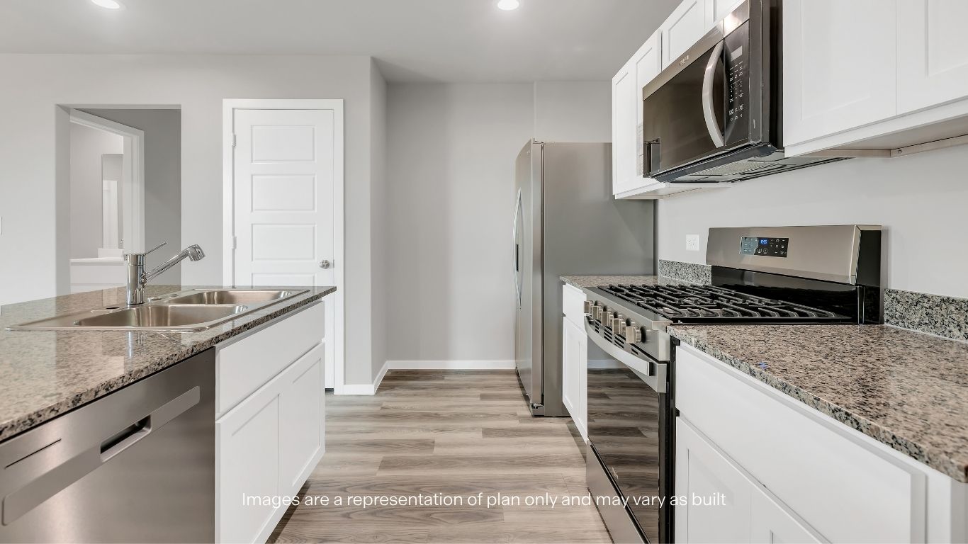 Seamless flow from kitchen to living area, designed for comfort and connection.