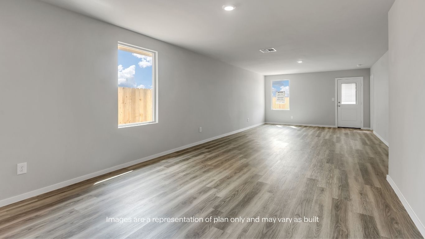 Comfortable primary suite offering natural light and a relaxing retreat.