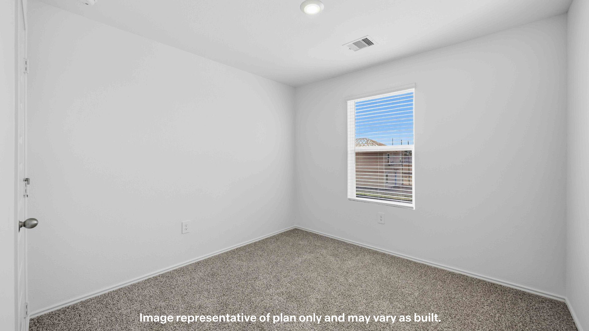 Upstairs guest bedroom 2 with plush carpet