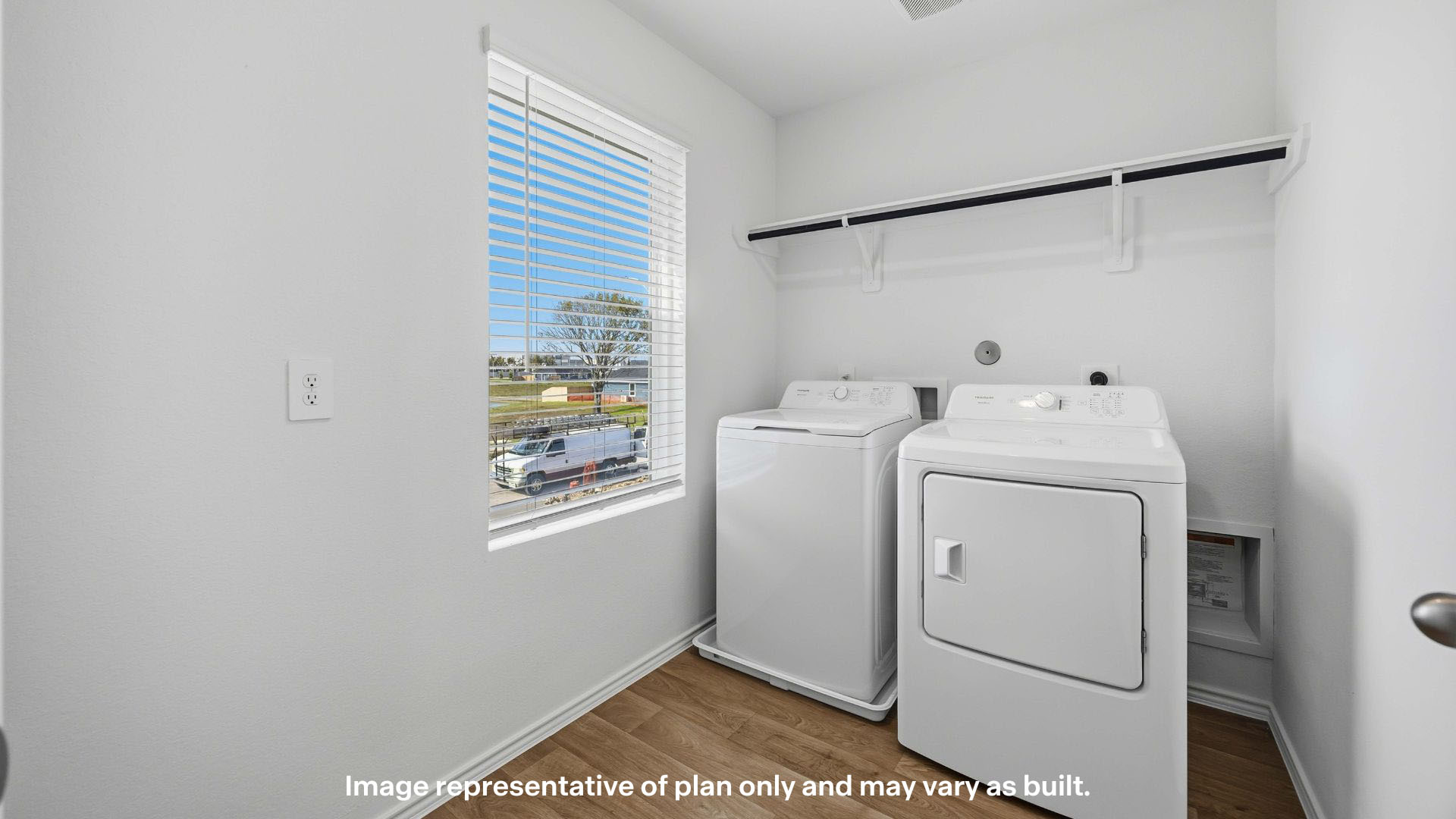 Laundry room and utility closet space with extra storage