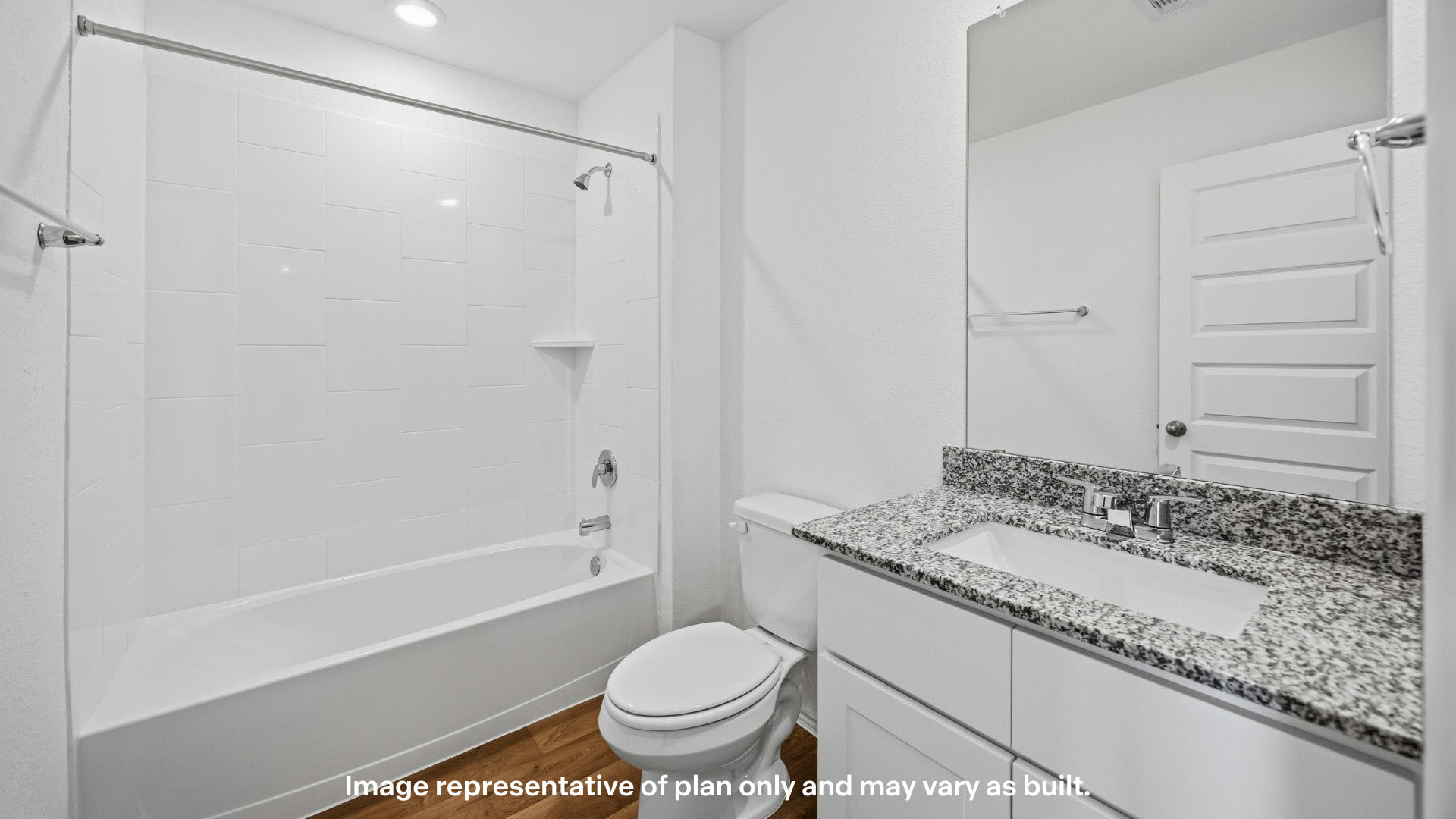 Upstairs guest bathroom with combination shower and bathtub