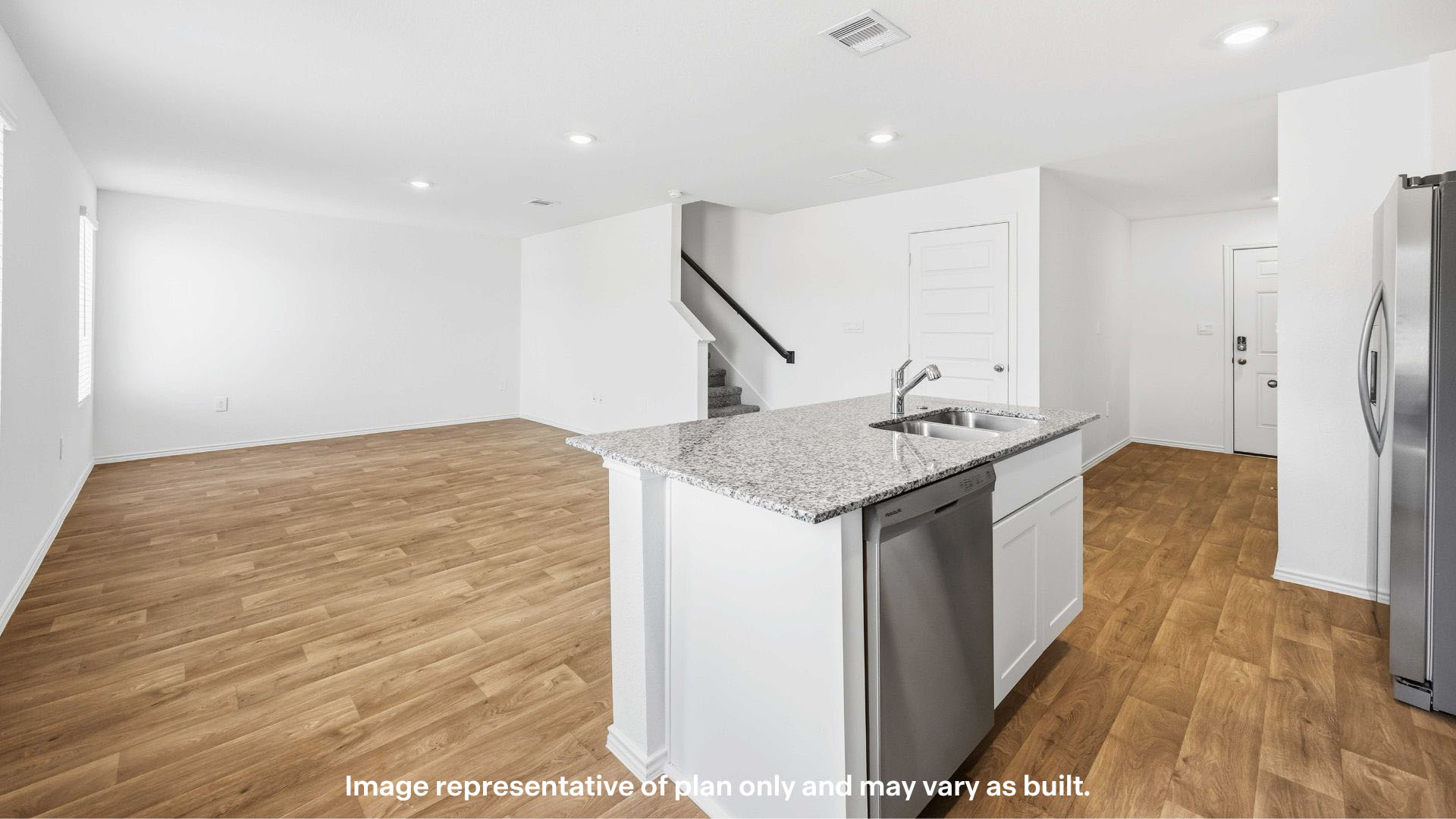 Spacious open kitchen overlooking family and living space