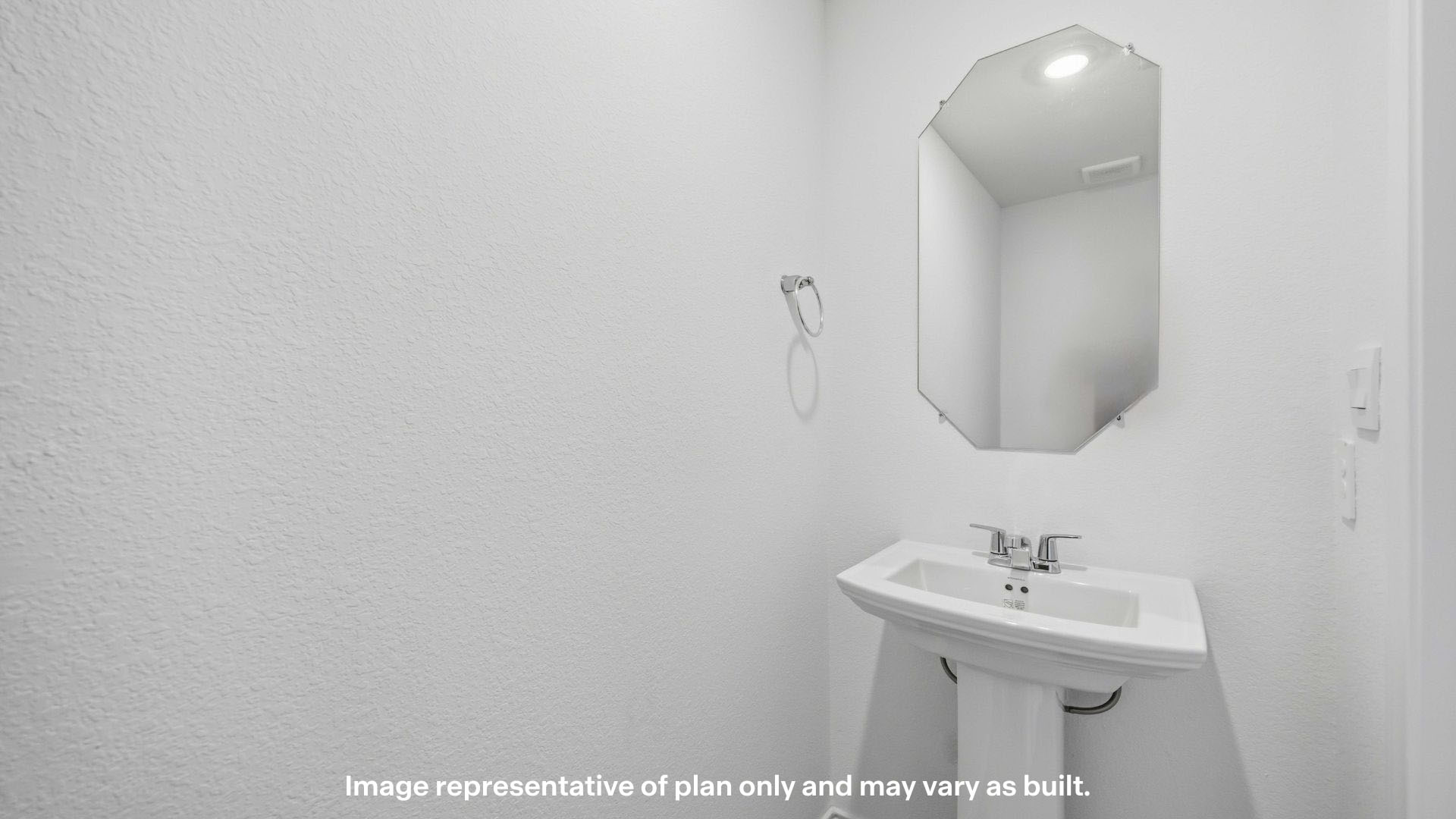 Half bathroom between common spaces