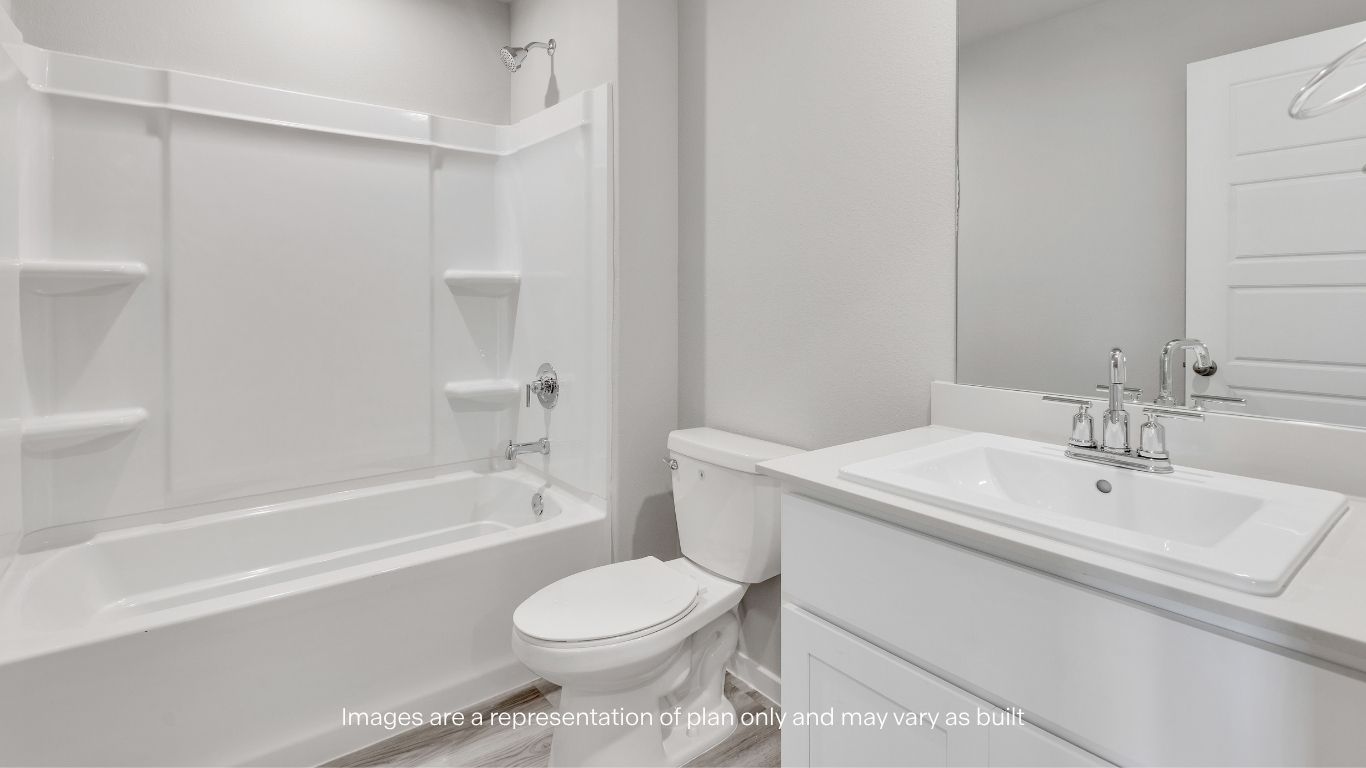 The upstairs full bathroom features a combination tub and shower, modern fixtures, a stylish vanity, and durable flooring designed for everyday convenience.