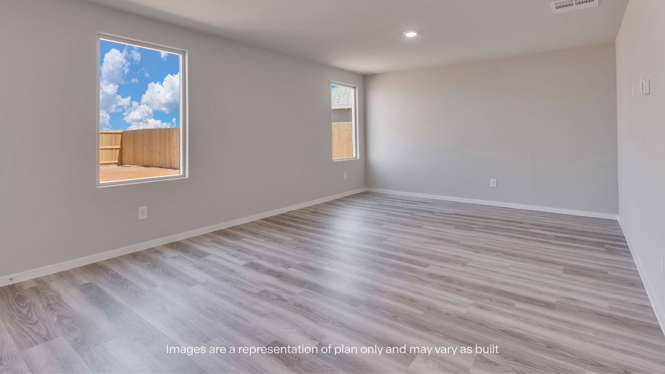 The open-concept family room offers plenty of space for relaxing, entertaining, and everyday living.
