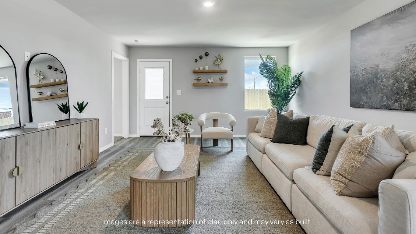 Spacious living and family room space with light allowing windows