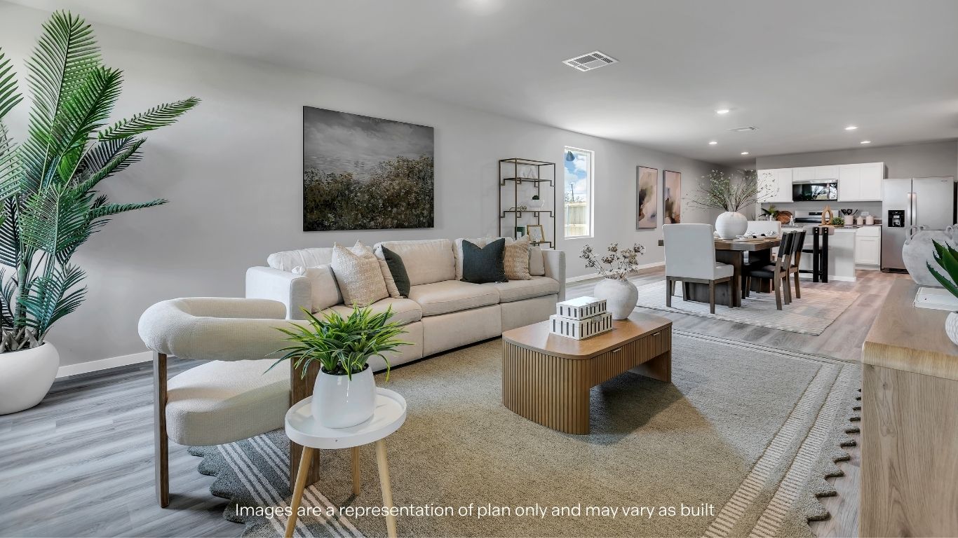 Open living and family room area with ample natural light