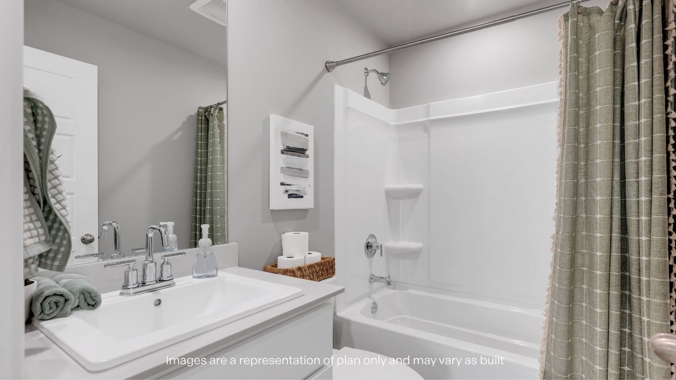 Guest bathroom with built in vanity and combination bathtub shower