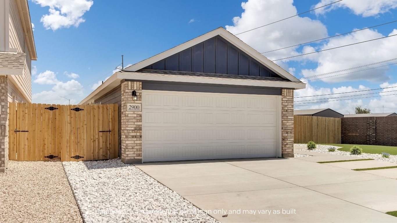 Exterior of one story modern brick home