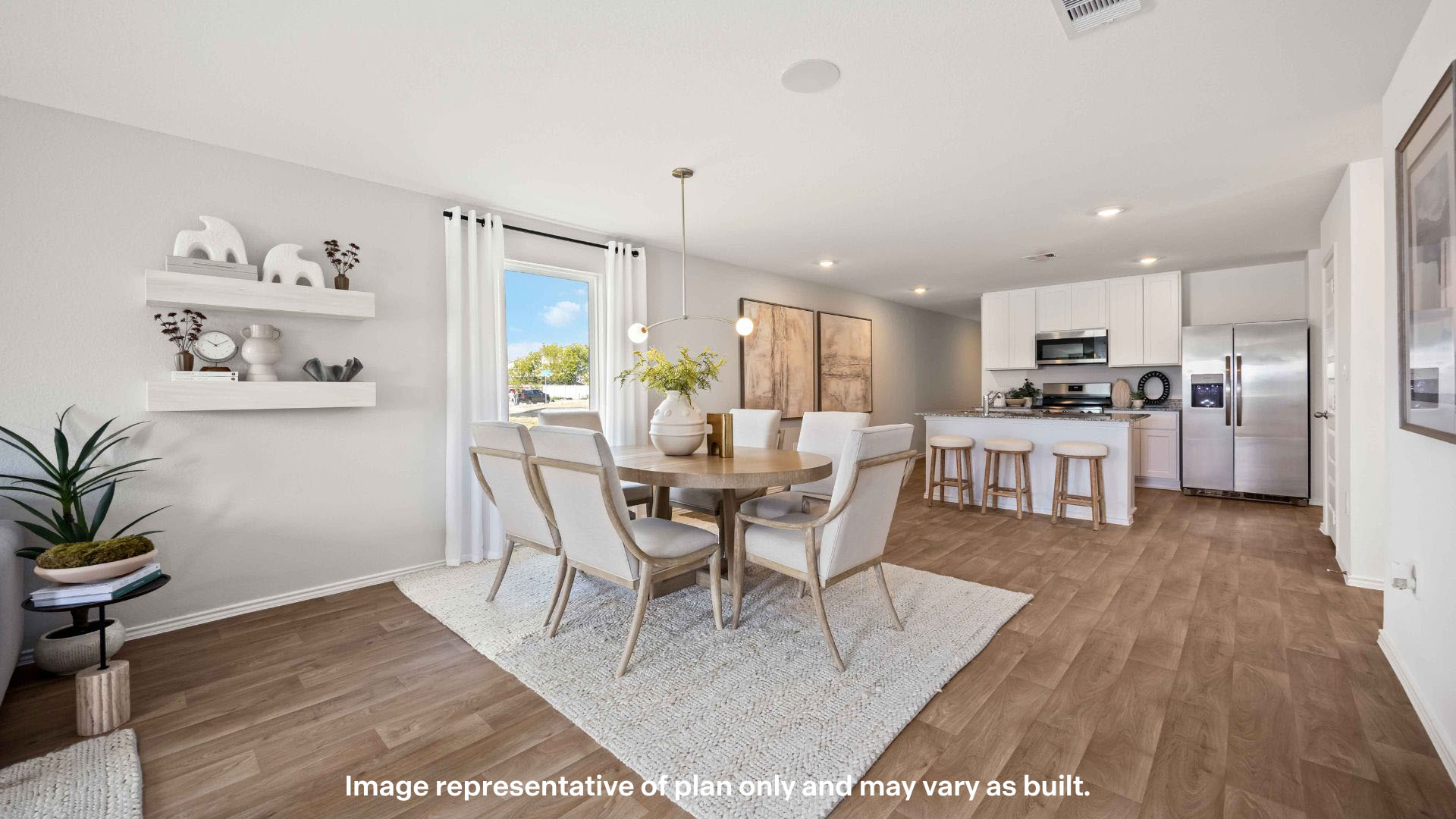 Open concept kitchen, living, family, and dining room space