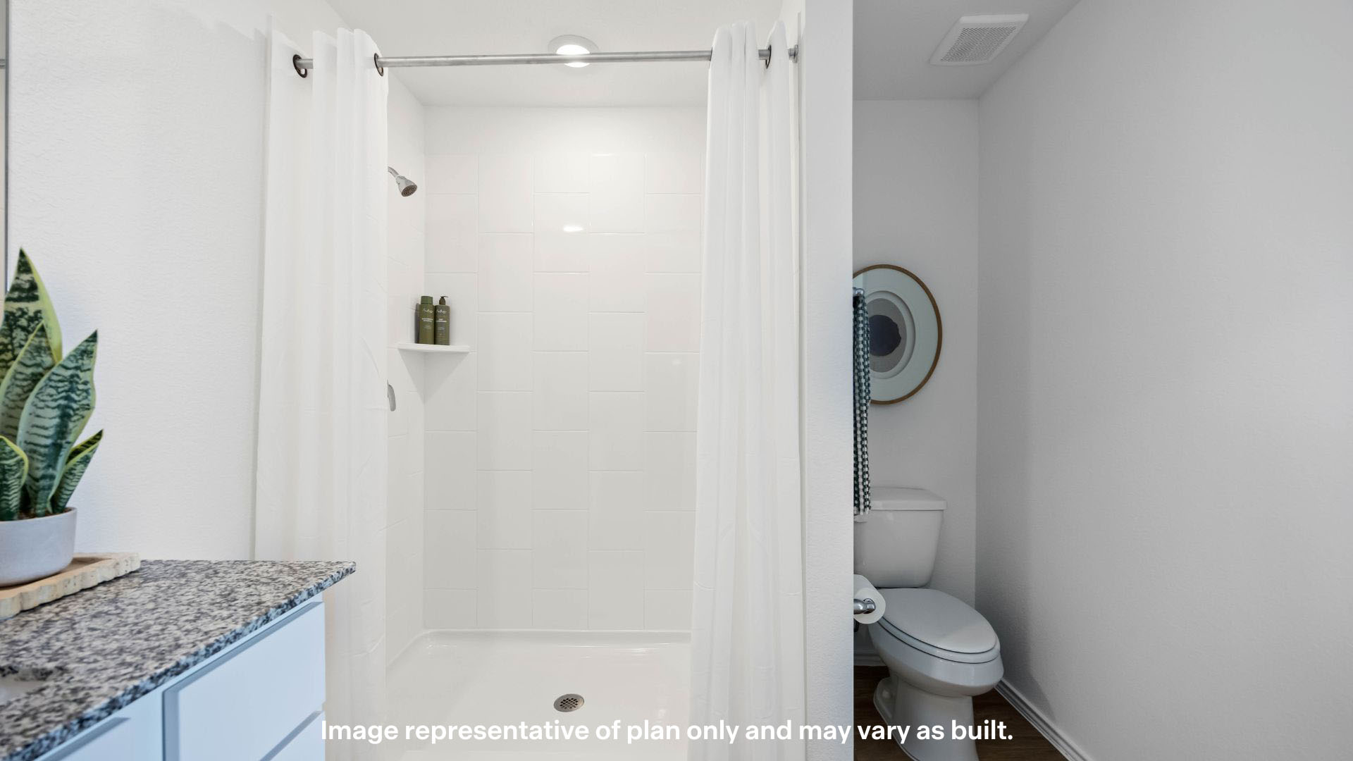 Primary bathroom with luxurious shower and built in storage