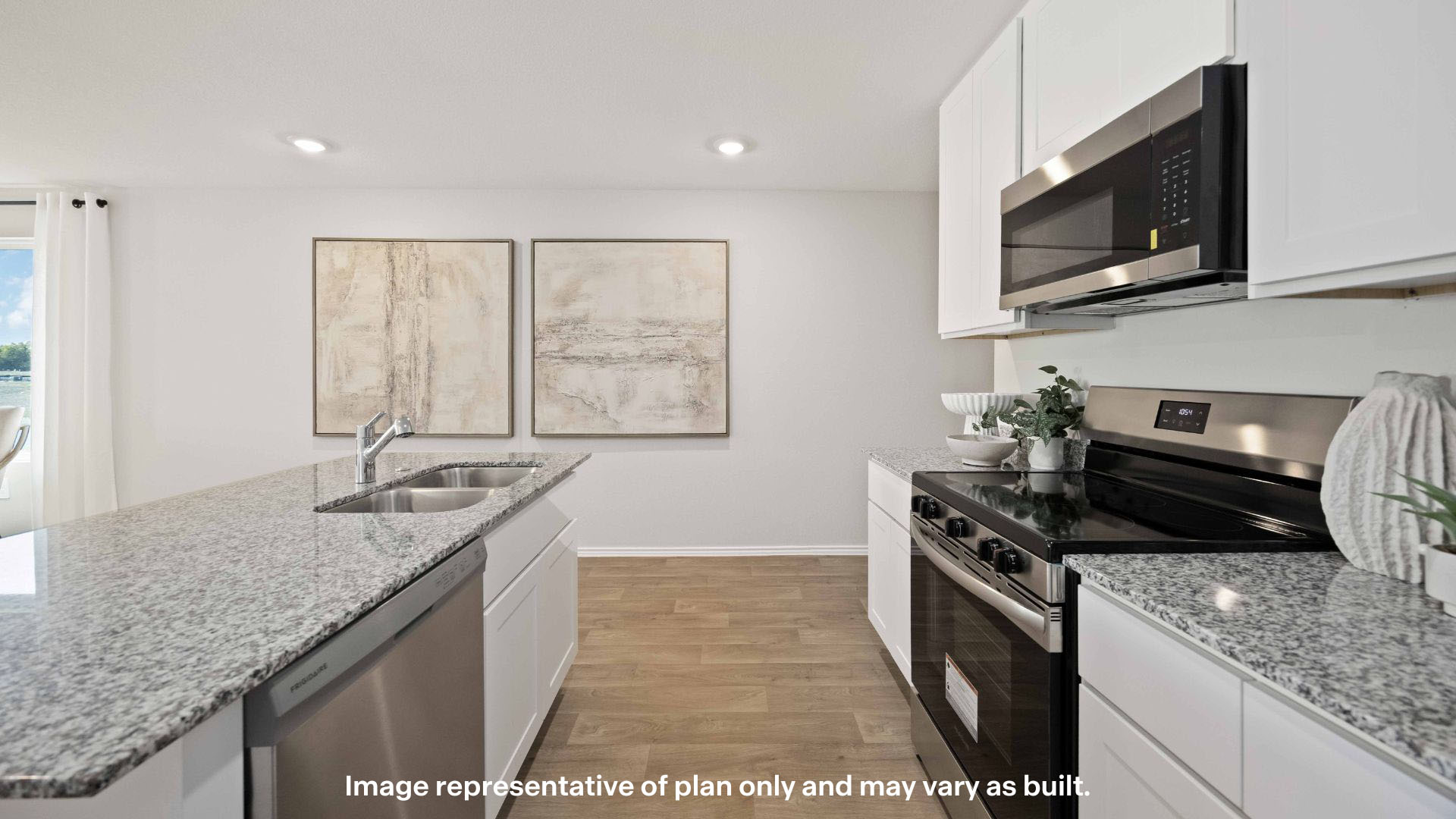 Spacious open concept kitchen with island and counter prep space