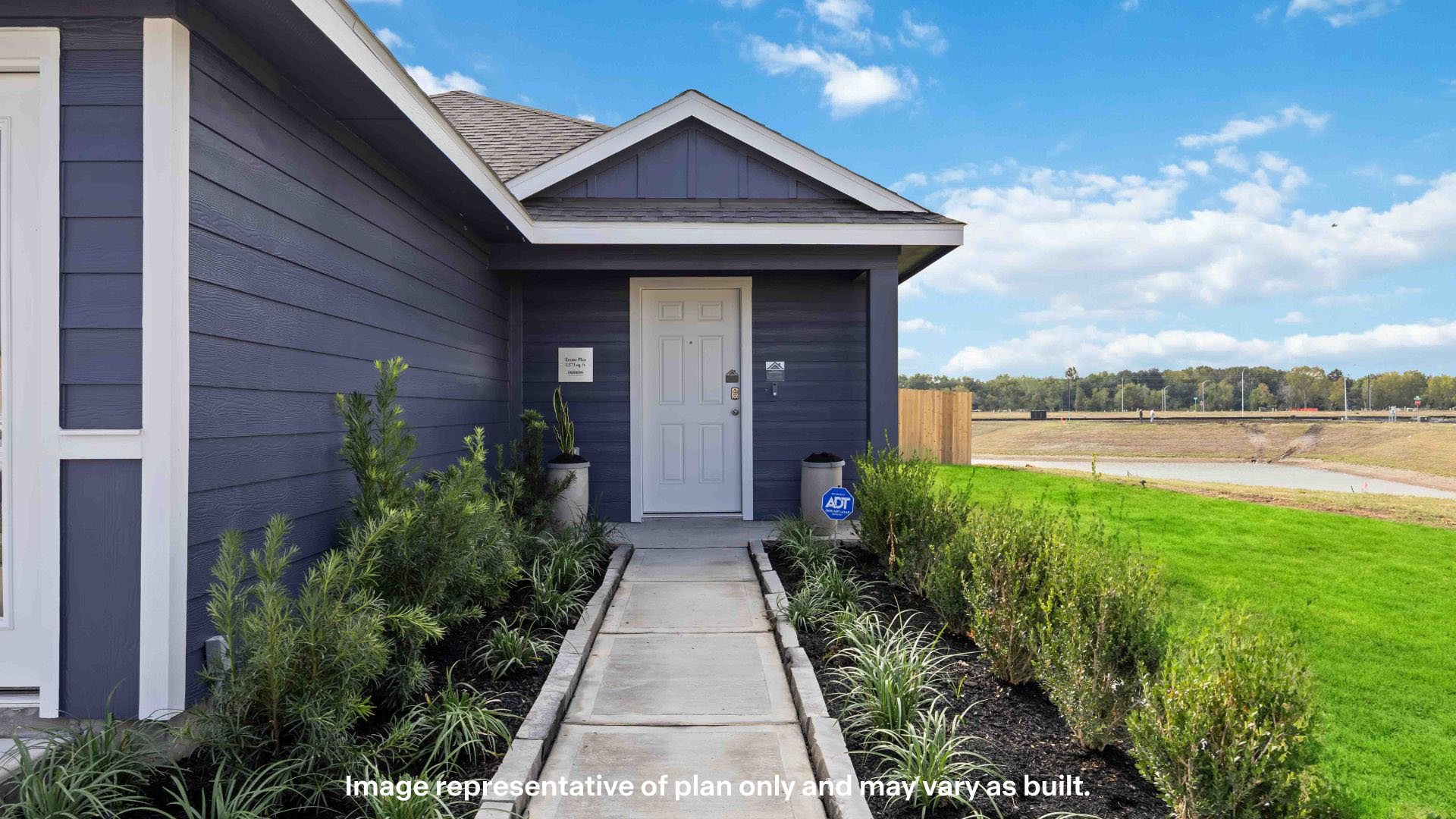 Single story classic brick home with front entry