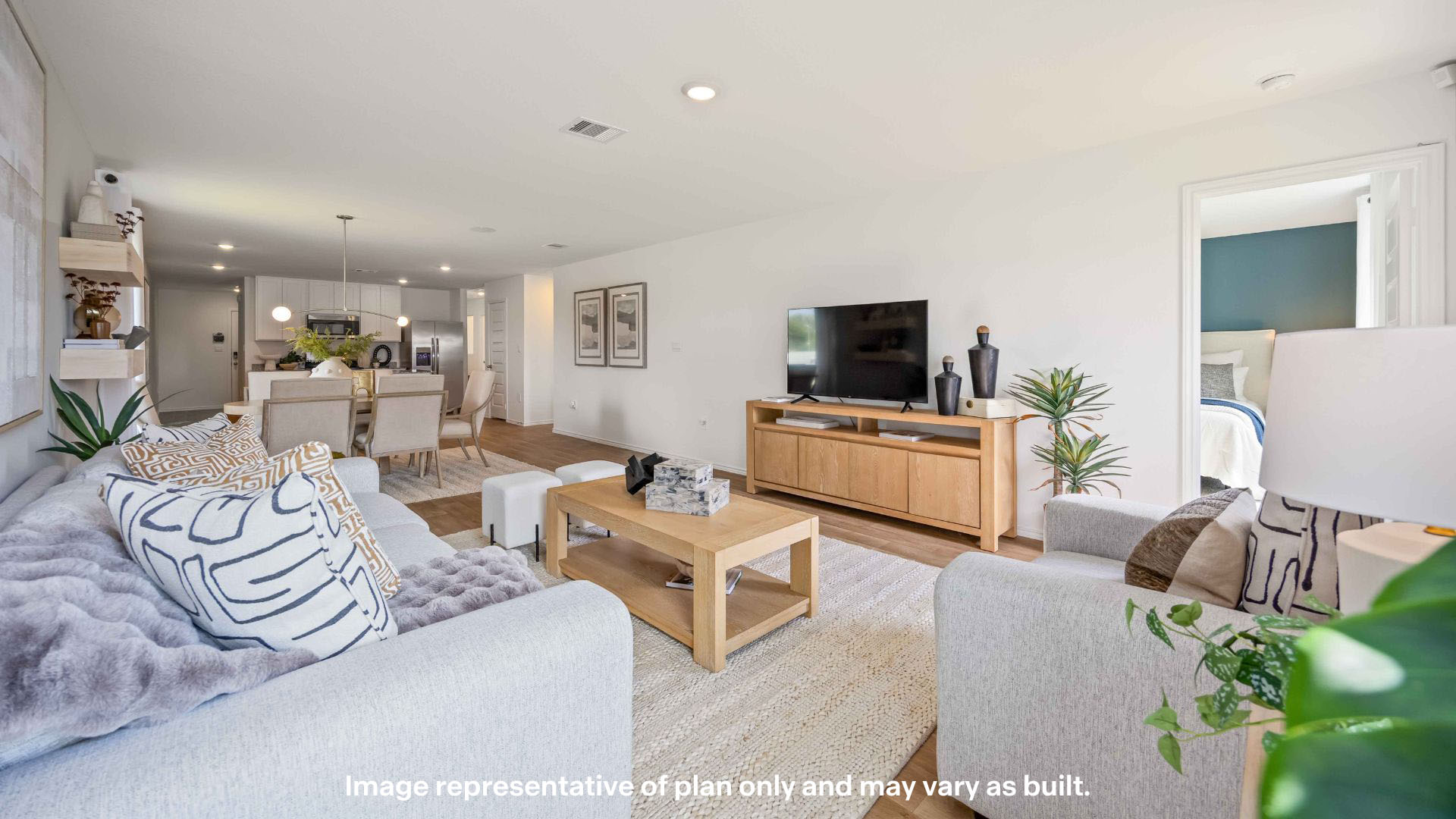 Open concept kitchen, living, family, and dining room space