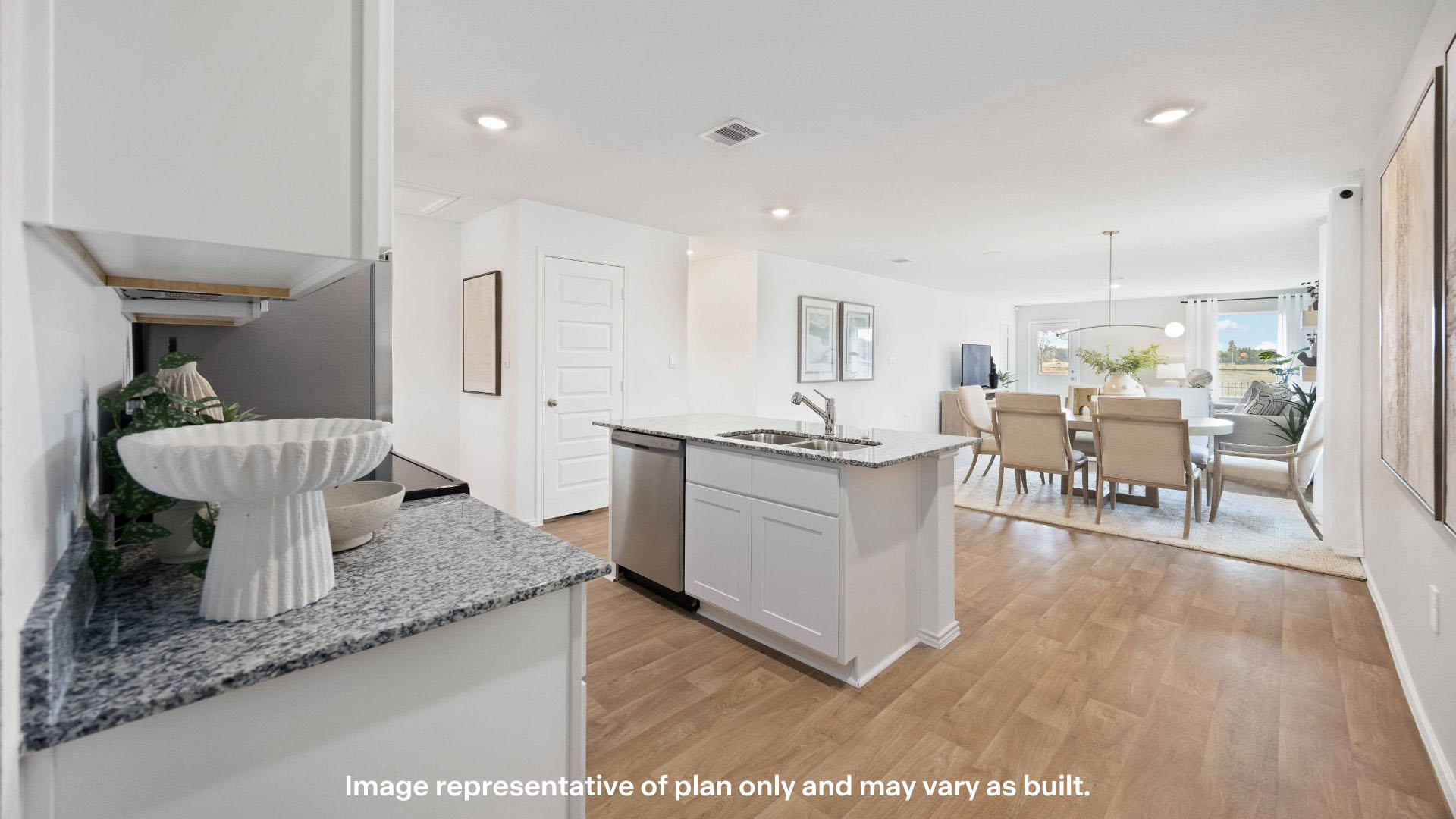 Spacious open concept kitchen with island and counter prep space
