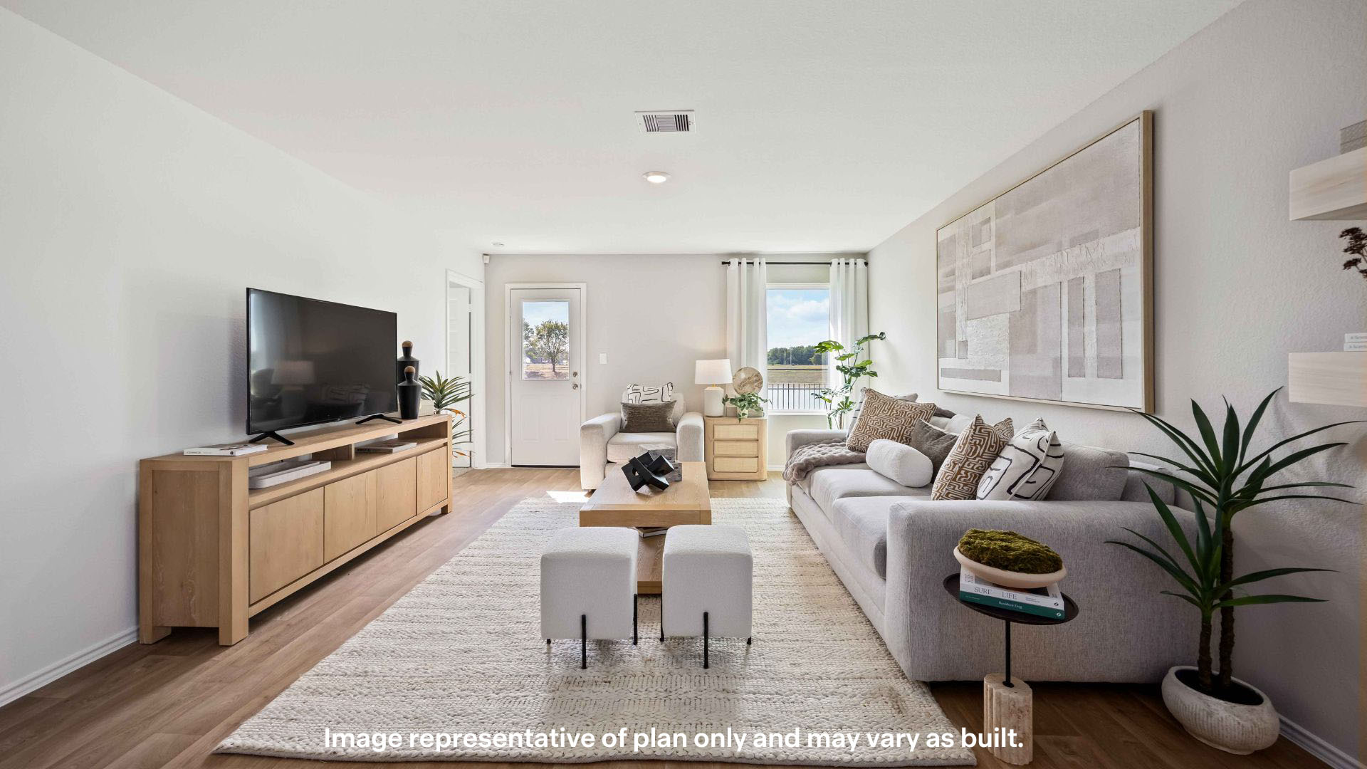 Open living and family room area with ample natural light