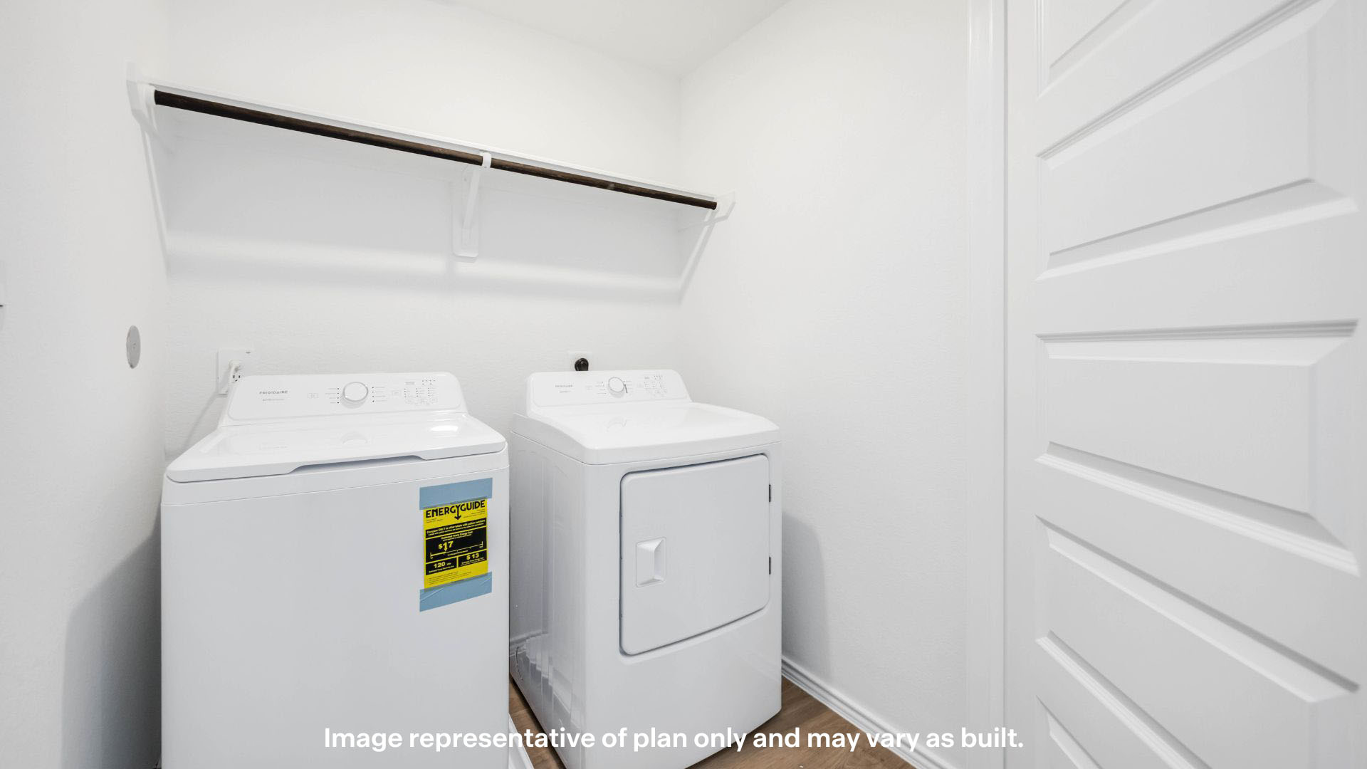 Laundry room and utility closet space with extra storage
