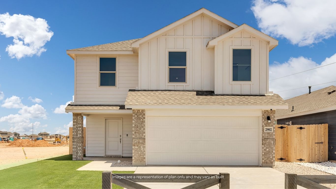 The Fallow showcases impressive curb appeal with its two-story design, durable siding exterior, attractive brick accents, and welcoming covered front porch.
