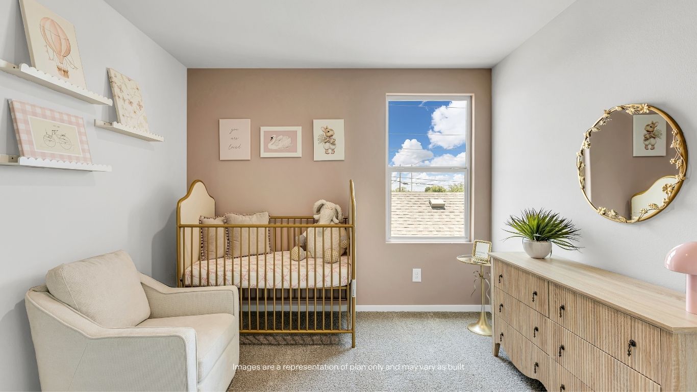 This charming secondary bedroom showcases the flexibility of the Fallow floor plan, making it ideal for a nursery, bedroom, playroom, or creative space.