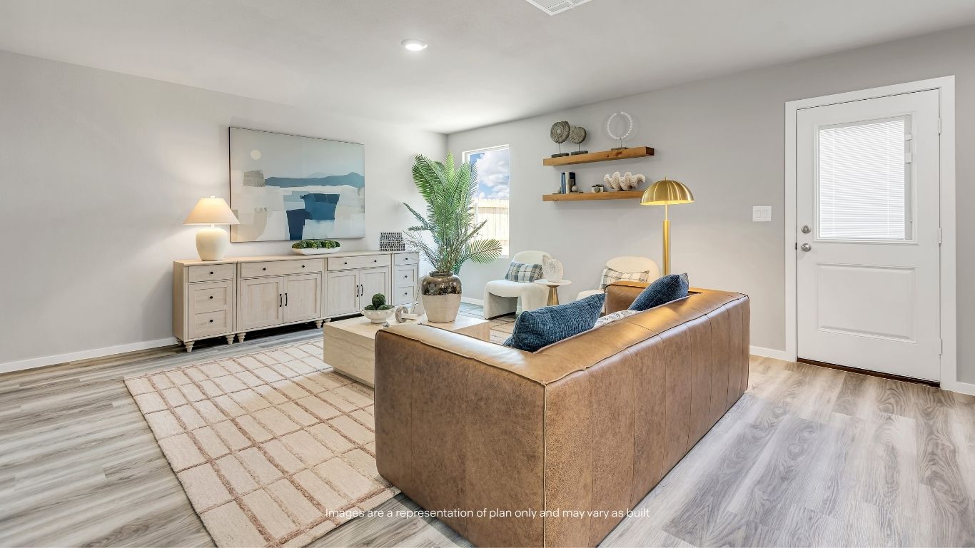 The large family room offers plenty of space for gathering with loved ones while maintaining a cozy and comfortable atmosphere.