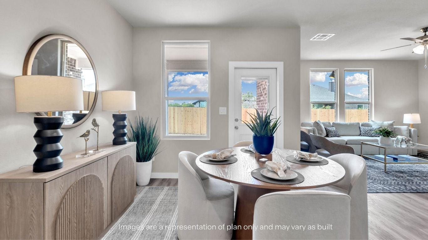 Open-concept dining area with seamless flow into the living room.