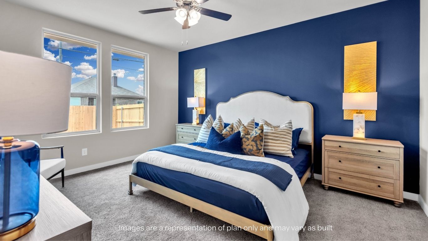 Private primary suite with stylish finishes and abundant natural light.