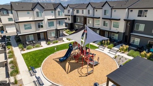 Amenities include a playground for children.