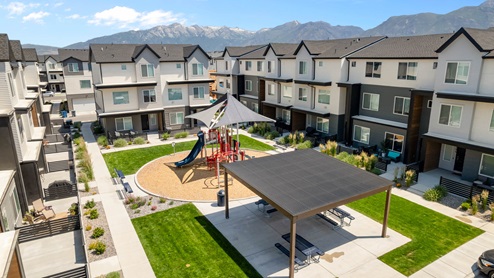 Amenities include a playground for children.