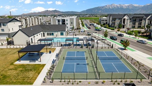 Amenities include a pickeball court for playing the sport.