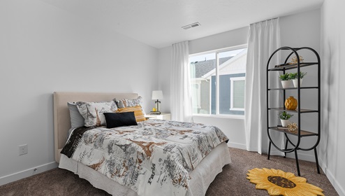 Secondary bedroom with one large window.