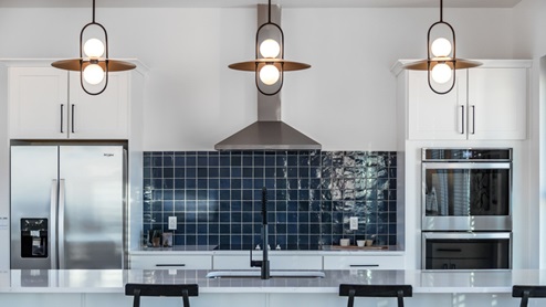 Northshore community clubhouse in Saratoga Springs Utah’s kitchen area for gathering and entertaining available to the residents to book for their events.