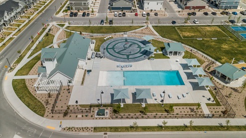Aerial photo of the Northshore community in Utah valley with a community pool, volleyball and pickleball courts for all residents to enjoy.