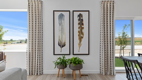 An example of the beautiful light and smart wall space the Clover model has to offer in the open concept main floor at Little Valley Gateway in Magna Utah.