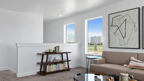 Upstairs in the Clover floor plan you will find two large windows letting a lot of light into a spacious loft area.