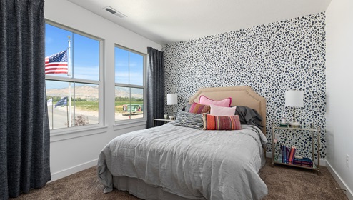 Secondary bedroom with two large windows letting beautiful light in.