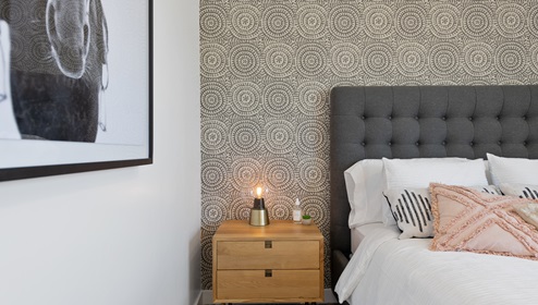 Secondary bedroom bed and side table.